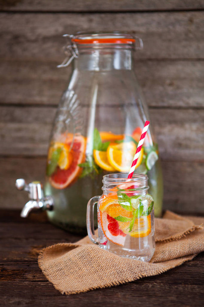 Homemade cold natural citrus lemonade with mint - Фото, изображение