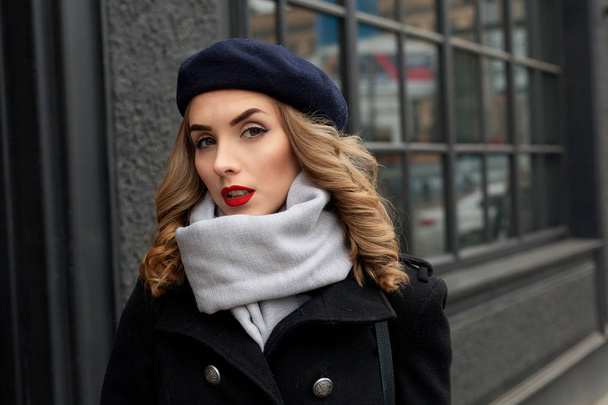 Street photo of young beautiful woman wearing stylish classic clothes. - Photo, Image