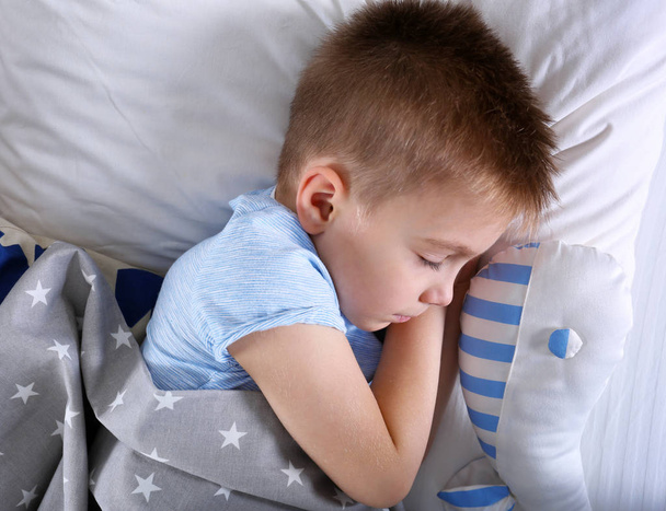 Little boy sleeping in bed - Photo, image