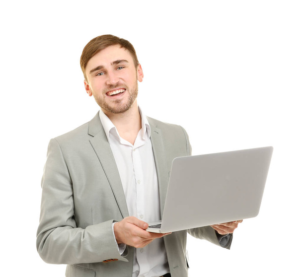 Handsome young man with laptop  - Φωτογραφία, εικόνα