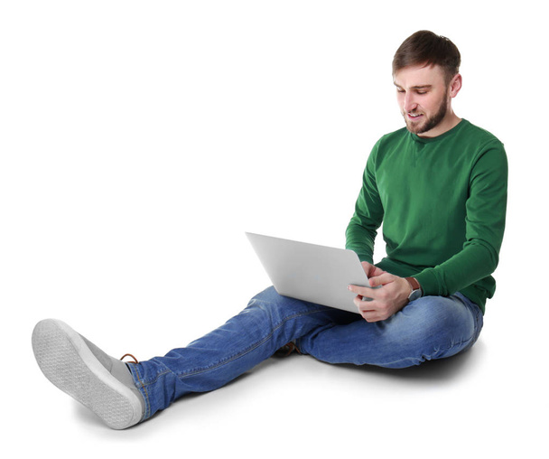 Young programmer using laptop - Fotó, kép