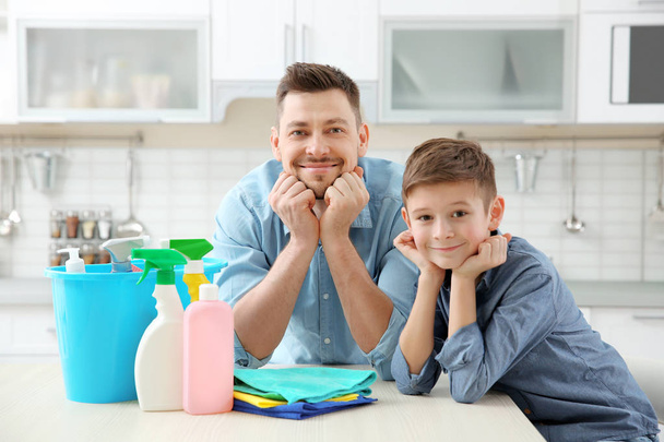 Dad and son preparing to do cleaning - Foto, imagen