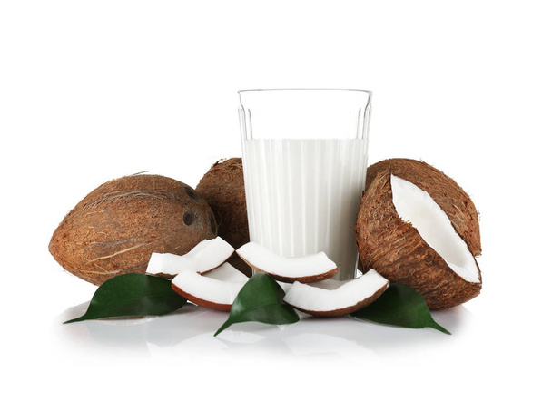 Glass of coconut milk with nuts  - Valokuva, kuva