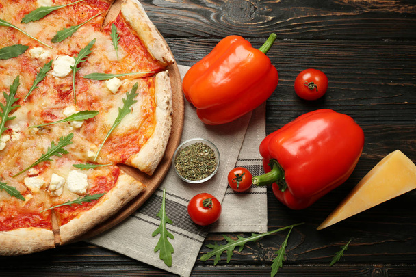 Delicious pizza with ingredients  - Photo, Image