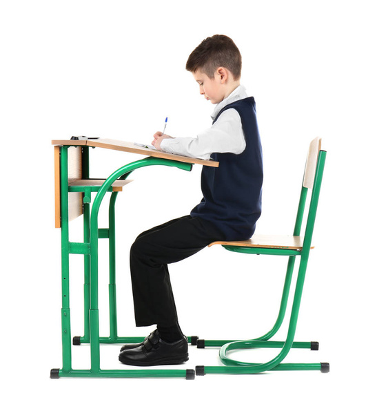 schoolboy sitting at desk - Foto, Imagen