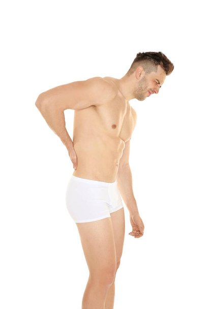 Young man suffering from back pain   - Φωτογραφία, εικόνα