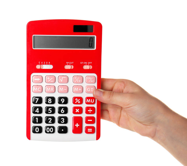 Hand holding red calculator - Foto, afbeelding