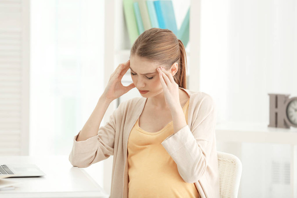 Pregnant woman suffering from headache - Photo, Image