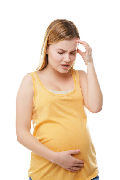 Pregnant woman suffering from headache - Foto, imagen
