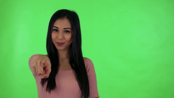 Asiatique femme pointant vers caméra
  - Séquence, vidéo