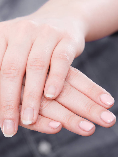 Woman presents hands nails. - Foto, immagini