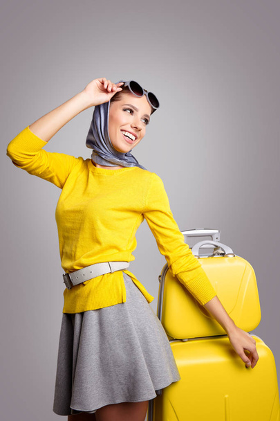 Glamour woman with yellow suitcase - Zdjęcie, obraz