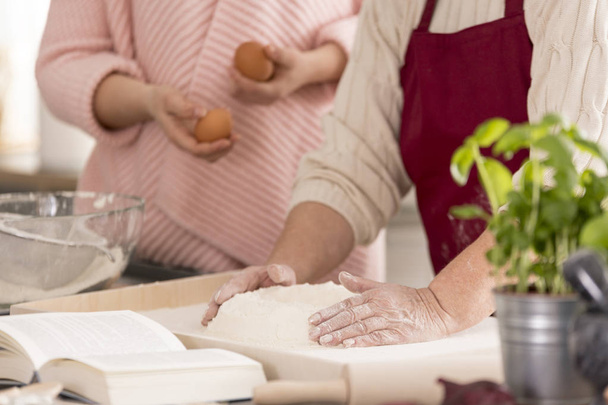Women baking cake - Photo, image