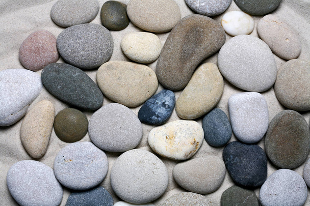 Zee stenen, zwarte en witte kiezelsteen achtergrondstructuur - Foto, afbeelding