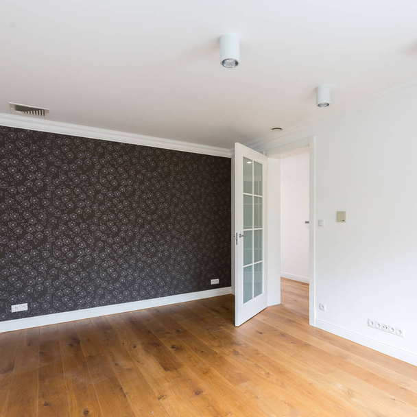 Empty room with decorative wallpaper - Fotó, kép