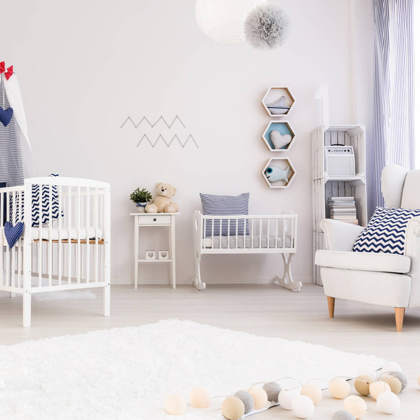 Baby room with simple white furniture - Фото, зображення