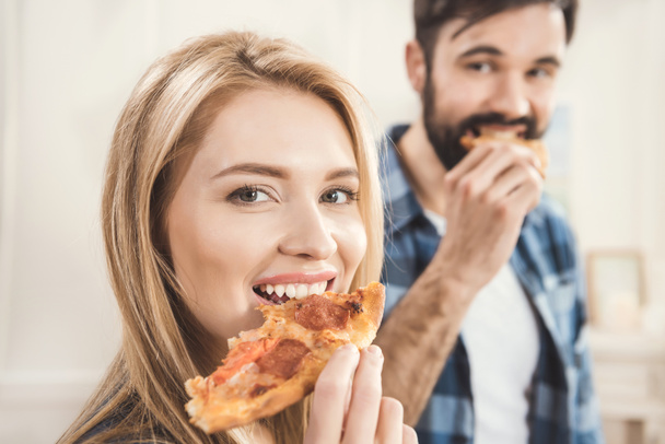 couple eating delicious pizza - Foto, Imagem
