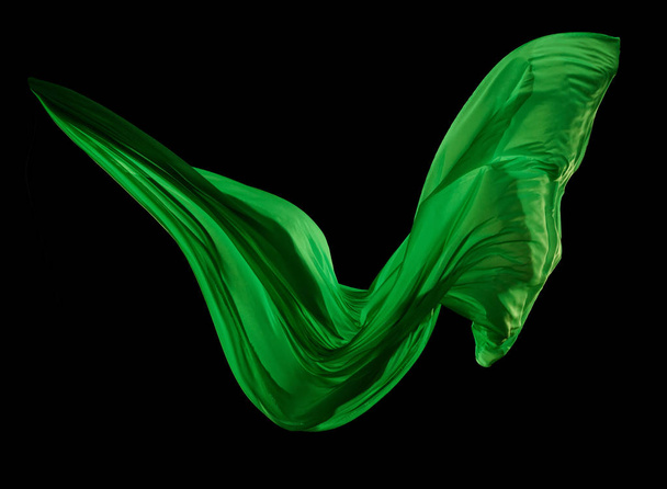 Smooth elegant green cloth on black background - Foto, Bild