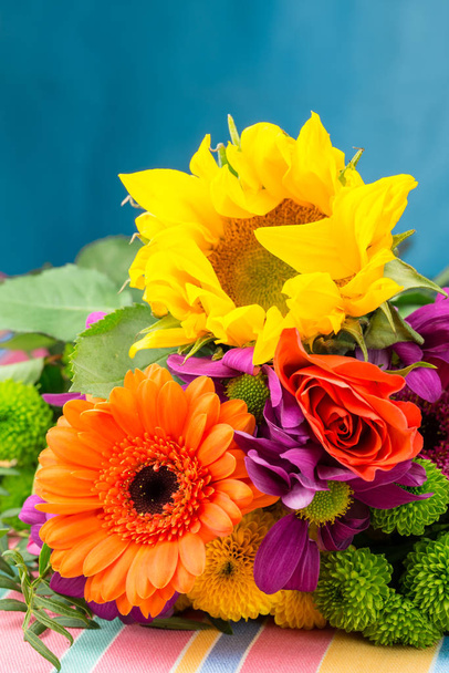 Sunflower and Gerbera in bouquet of florist flowers. - Фото, зображення