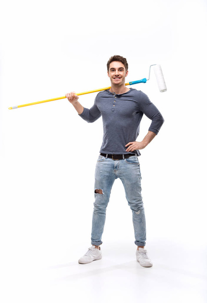 man holding paint roller - Photo, Image