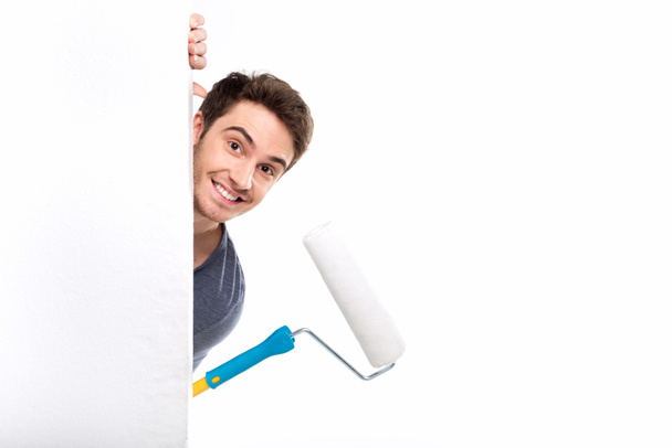 man holding paint roller - Photo, image