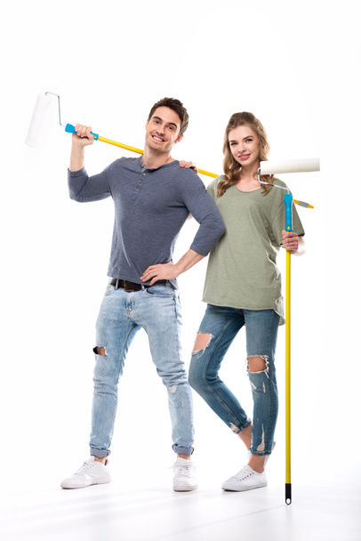 couple holding paint rollers - Photo, Image