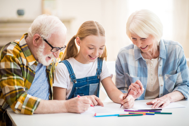 Girl with grandparents drawing - Photo, Image