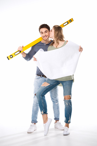 Young couple with blueprint  - Foto, Bild