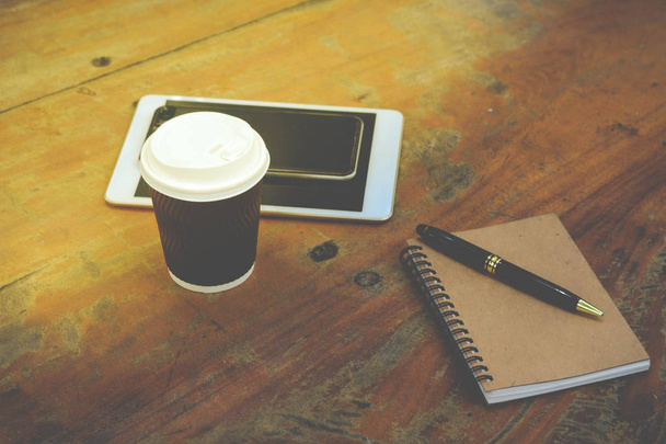 Smart phone, tablet, note book, pen and coffee - Φωτογραφία, εικόνα