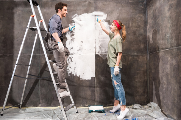 couple painting wall - Photo, Image
