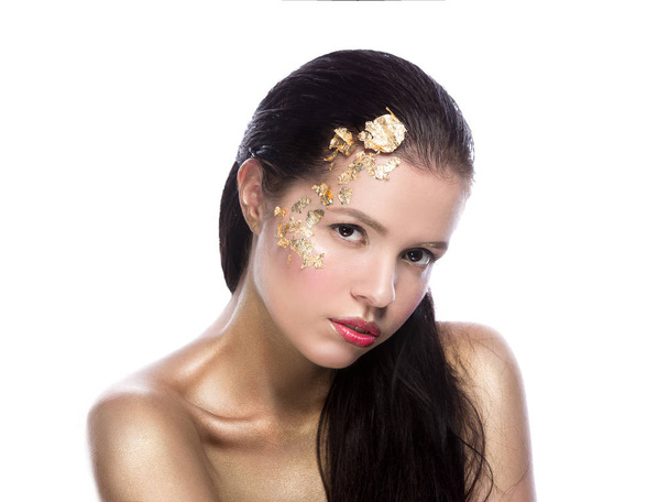 Fashion girl portrait with beauty gold makeup - Photo, image