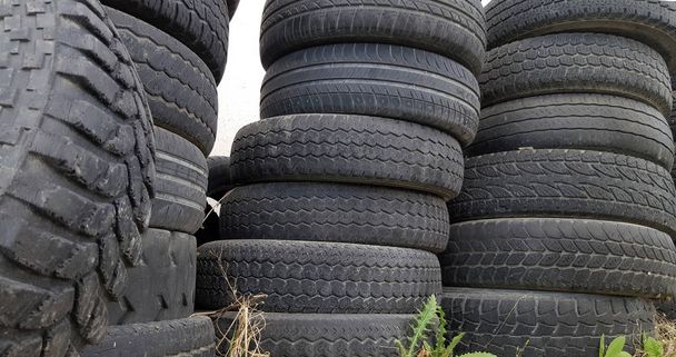 Stack of old and worn automobile tires - Photo, Image