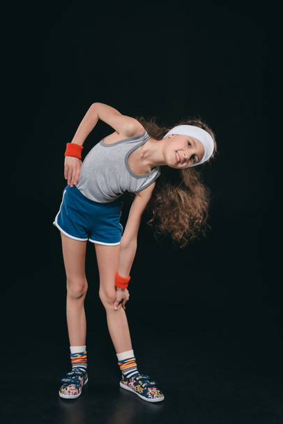 Chica en ropa deportiva de ejercicio
  - Foto, Imagen