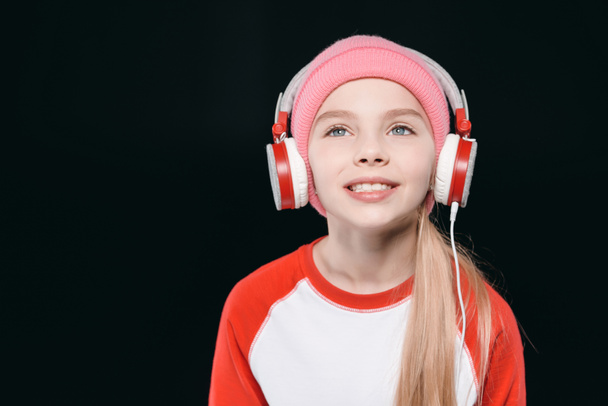 Sporty girl in headphones  - Photo, Image