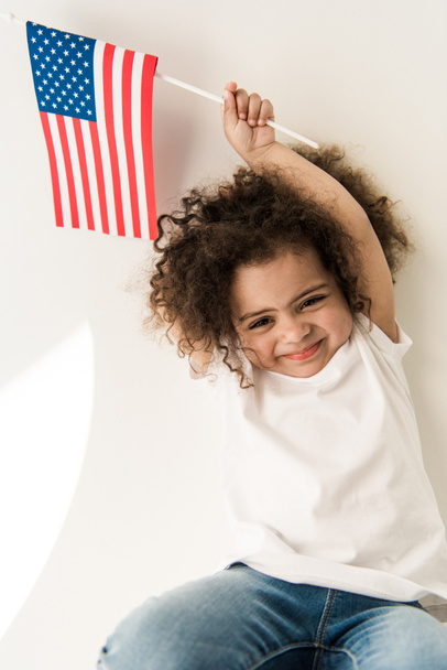 baby girl with american flag - 写真・画像