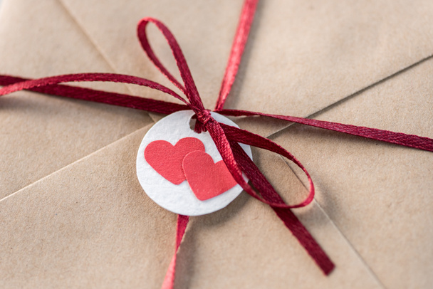 envelope with tag with hearts - Zdjęcie, obraz