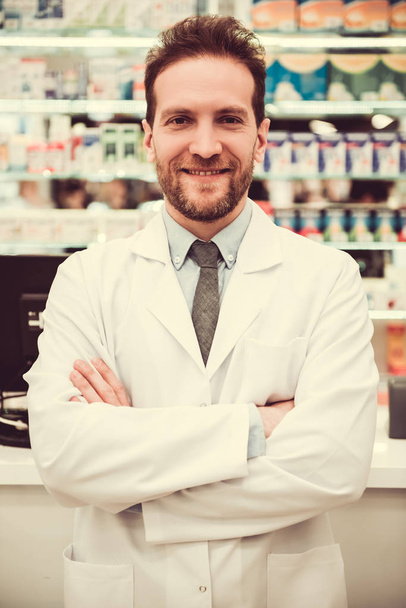 Handsome pharmacist at work - Photo, image