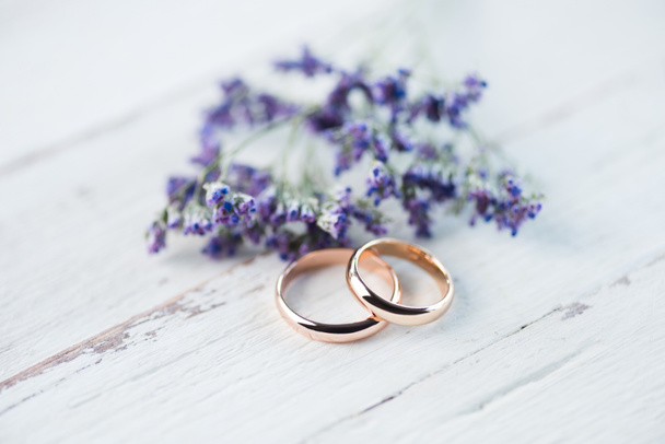 Wedding rings and flowers - Photo, Image