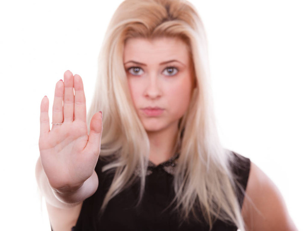 Woman making stop gesture with open hand - Photo, Image