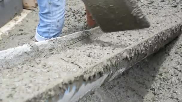 Mixing cement concrete at construction site - Footage, Video