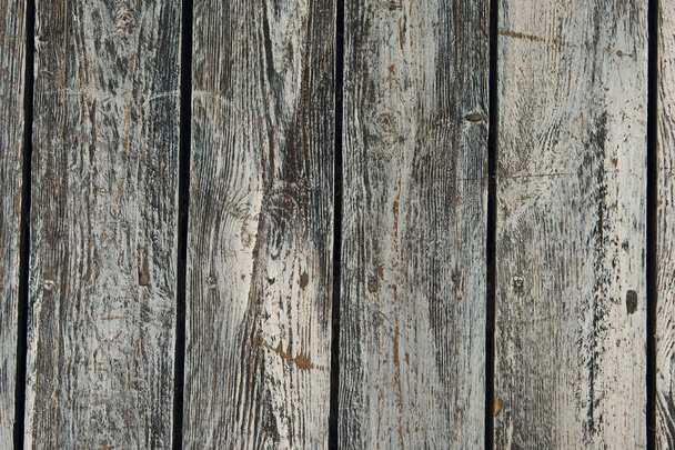 Vertical old cracked wooden plates with horizontal gaps, planks  - Фото, изображение