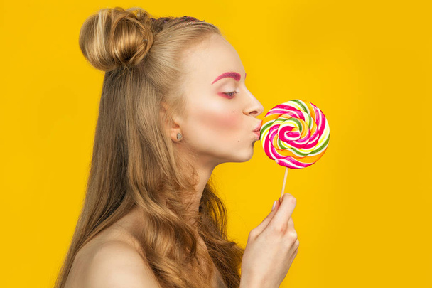 Bright portrait of young funny beautiful woman with colorful lol - Photo, image