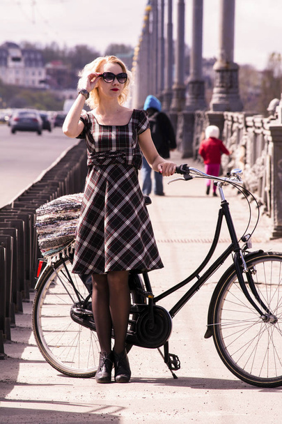 Pretty girl and retro bike  - Фото, зображення