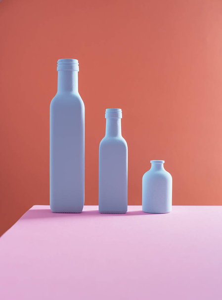 Three bottles  on background - Foto, Imagem