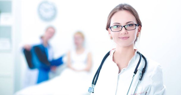 Woman doctor standing at hospital - Photo, Image