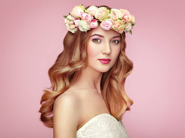 Beautiful blonde woman with flower wreath on her head - Fotografie, Obrázek