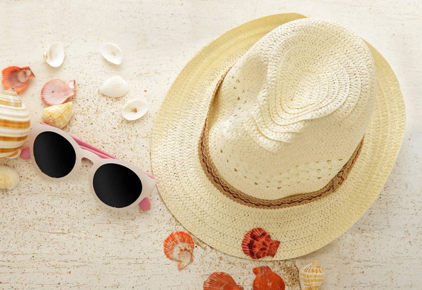 sunglasses and straw hat  - Photo, Image