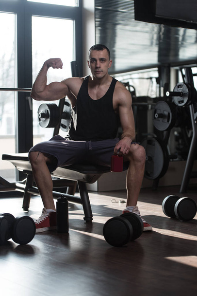 Athlete Posing With Supplements For Copy Space - Foto, Imagem