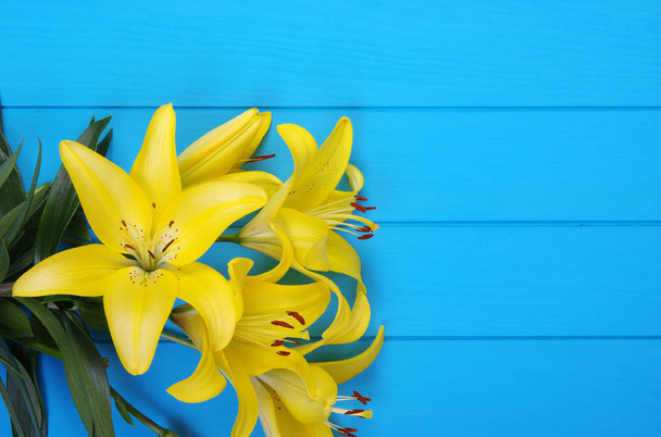  lily flowers on wooden planks - Photo, Image