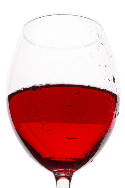 A glass of wine on a white background.  - Foto, afbeelding